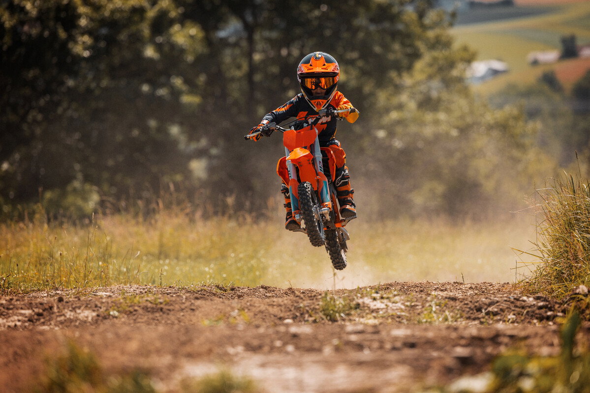 KTM SX-E 3 ridden on dirt track